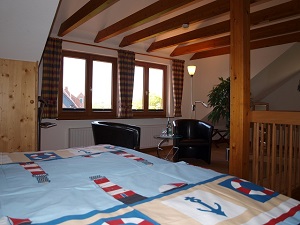 Ferienhaus Lütt Hüs - Schlafzimmer Bild 1