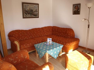 Ferienhaus Lütt Hüs - Wohnzimmer Bild 4